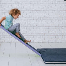 Load image into Gallery viewer, EZPlayToys Plush Play Mat - child sliding down slide onto playmat safely, enjoying the product