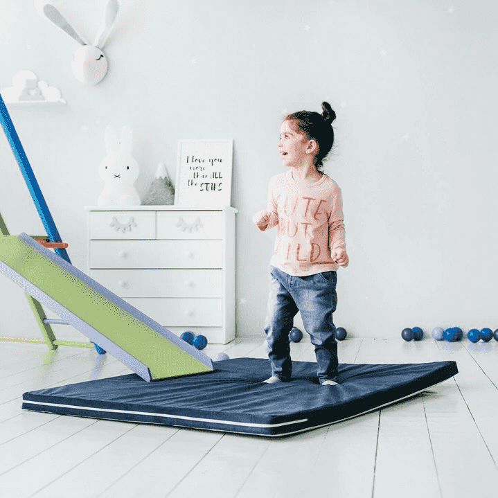 EZPlayToys Plush Play Mat - Cut 4 year old girl laughs as she plays on quality playmat