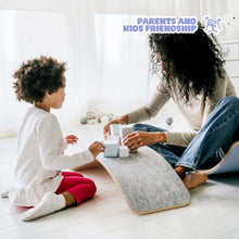 Load image into Gallery viewer, EZPlayToys Wobble Board mother and daughter playing on wobble board upside down as a table top
