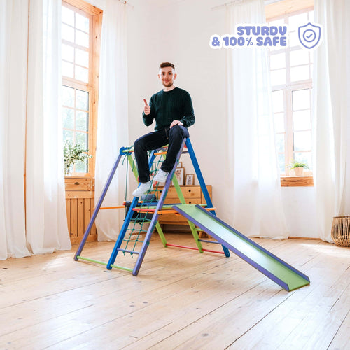 EZPlayToys Panda Playground Toddler Jungle Gym - a young adult sits on the top of the playset demonstrating the sturdiness and safety of the product